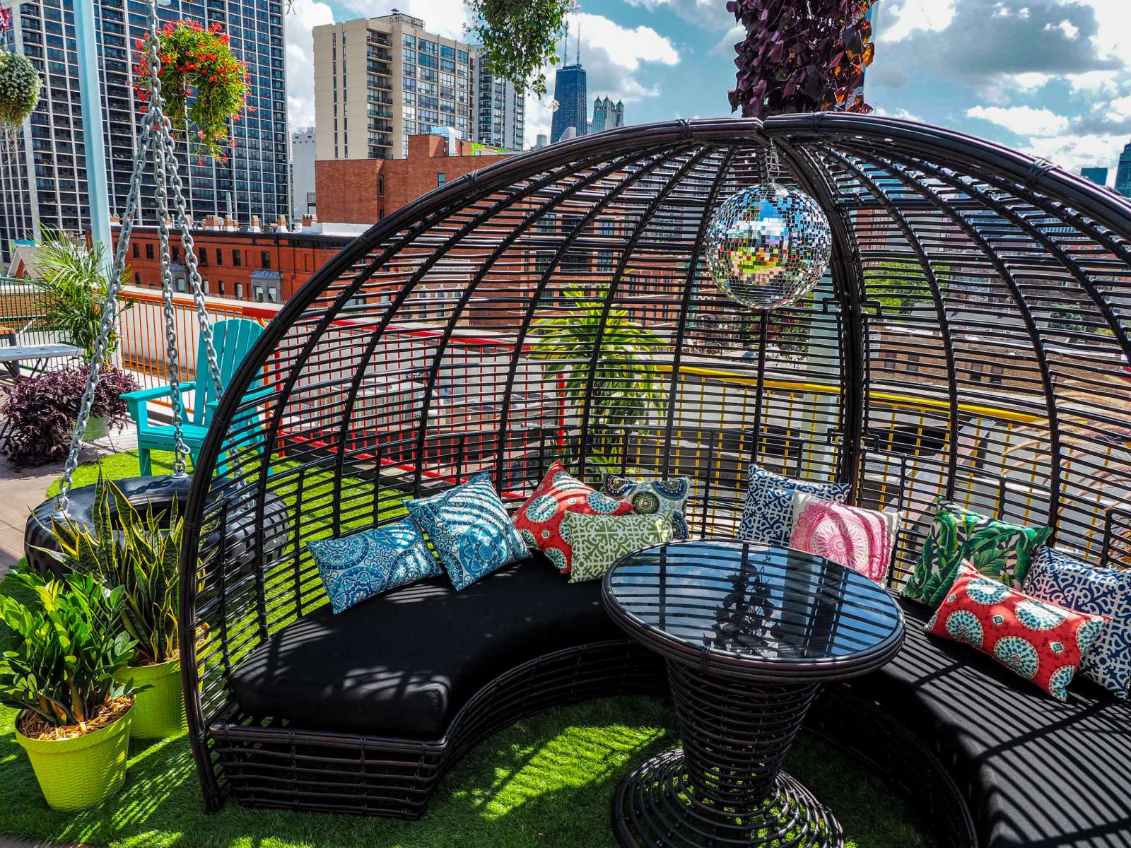 Lounge seating with Chicago skyline views at Utopian Tailgate rooftop bar